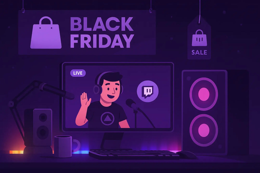 Streaming-Schreibtisch mit Monitor, Mikrofonarm, Lautsprechern und Black-Friday-Banner, auf dem ein Twitch-Streamer live in die Kamera winkt.
